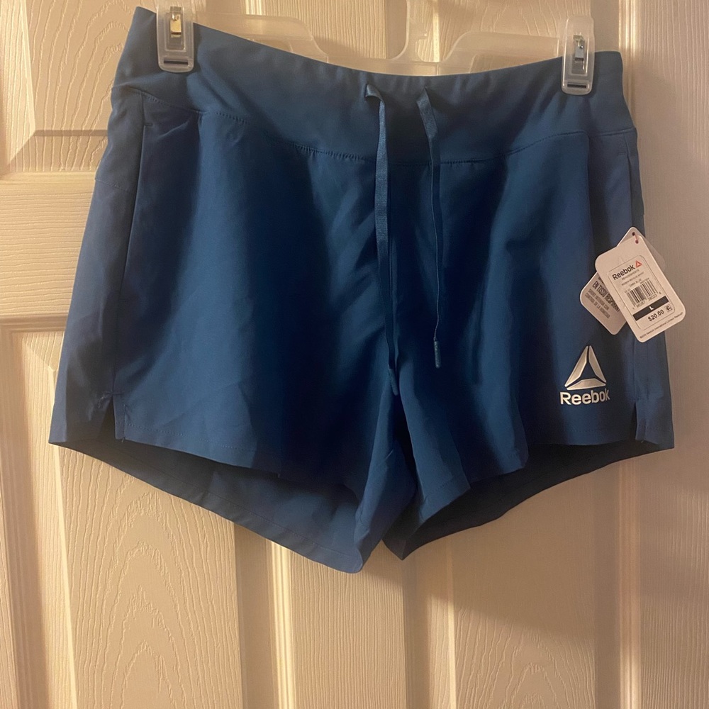 Reebok Women's Revolve Running Short with Back Pocket     Size Large Dark Blue